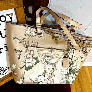 Guess floral tote purse; gold with white flowers; like new, 17”x10”